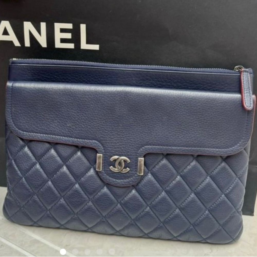 Chanel Calfskin Clutch 
Comes with dust bag and original box.
100% authentic